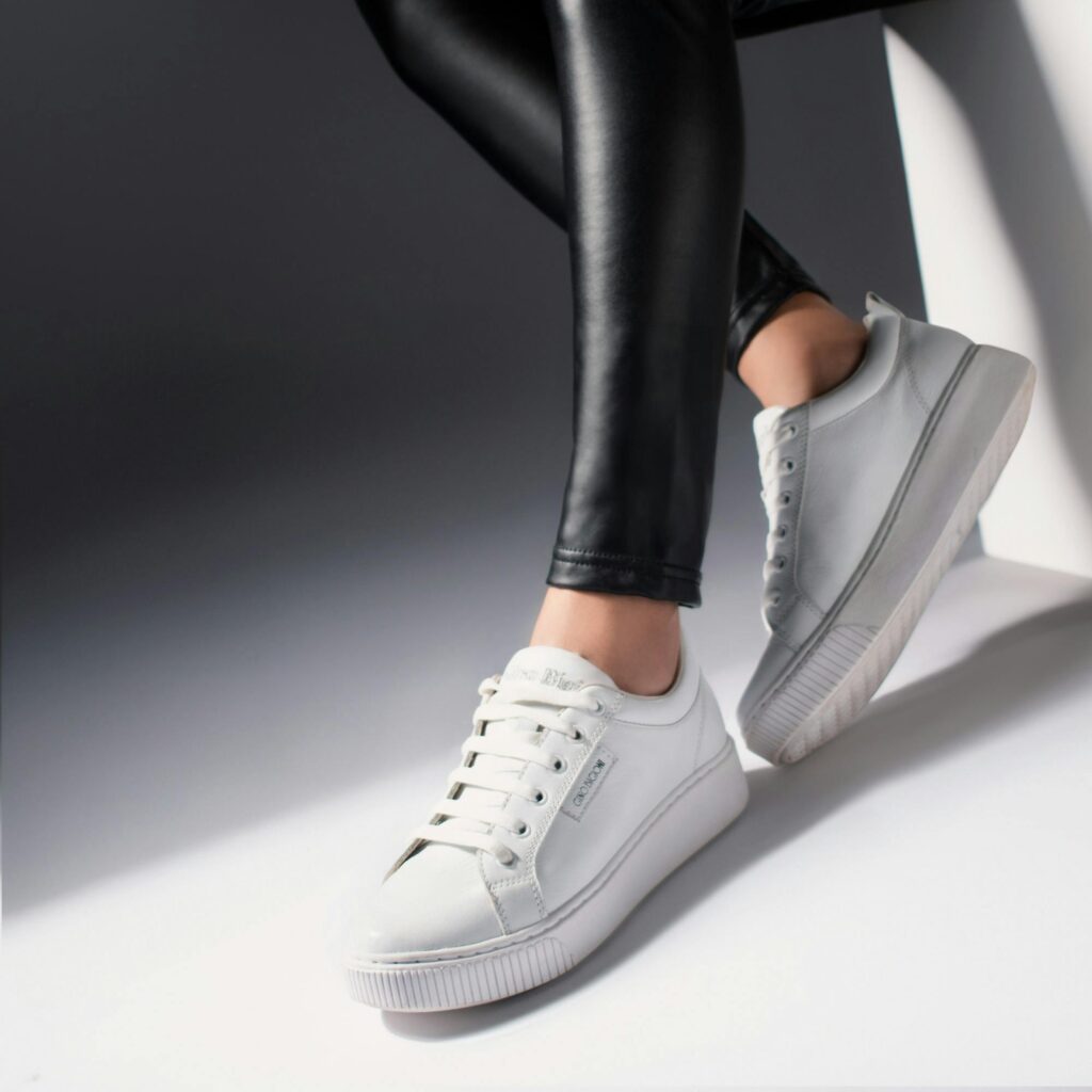 White sneakers paired with tailored suit for modern smart casual look