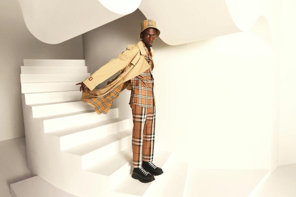 Luxury sneakers paired with a tailored suit demonstrating modern business casual style